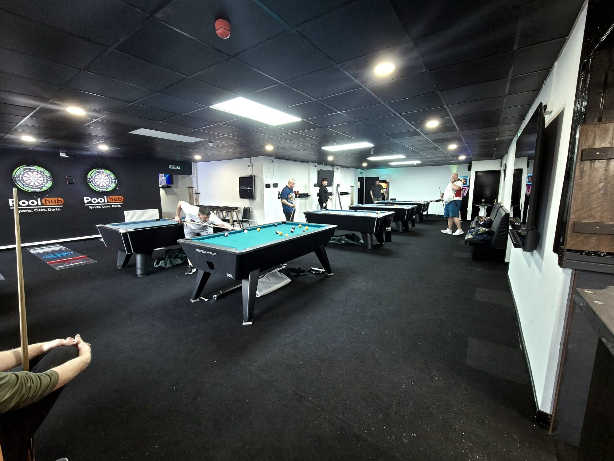 Inside Pool Hub, Porth — rows of Rasson Apollo pool tables